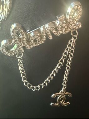 CHANEL Silver Crystal Logo Chain Pin with Dangling CC Charm Chanel inspo piece